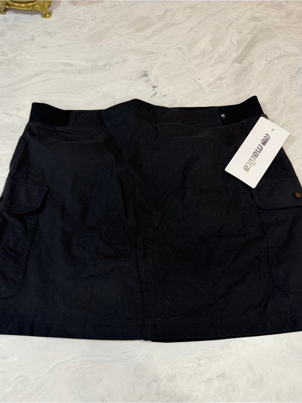 Black utility skirt with shorts